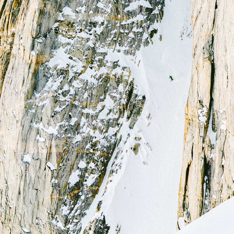 Snowboarder Nick Russell backcountry snowboarding on United Shapes Covert