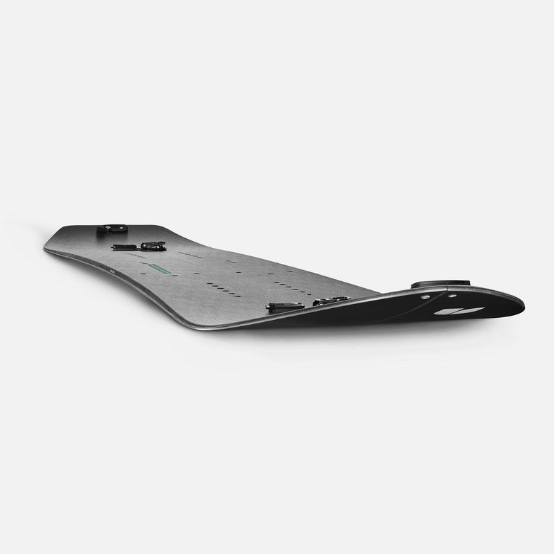 United Shapes black and green splitboard Covert camber shot