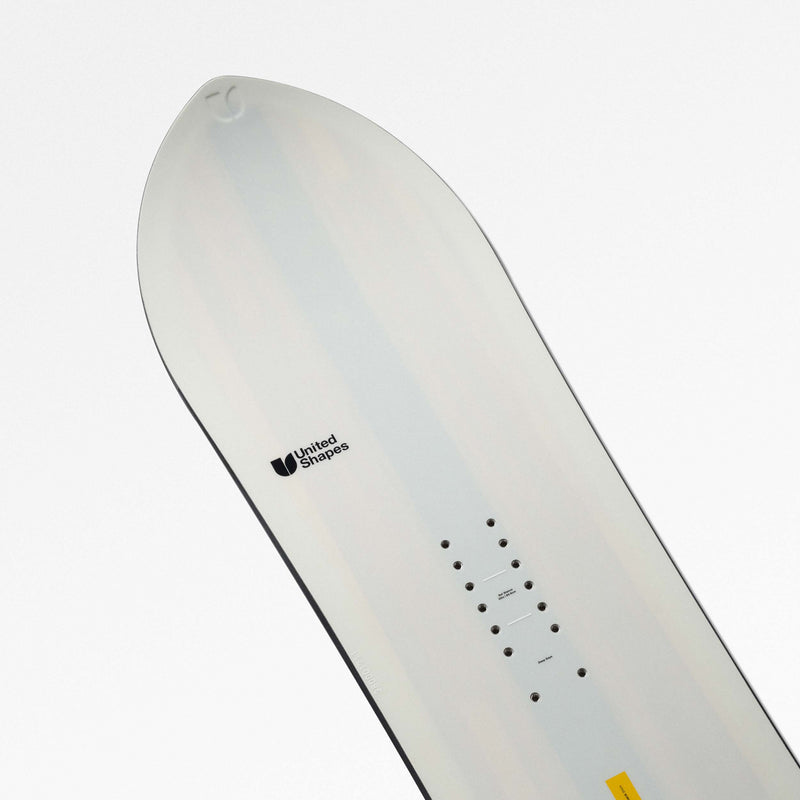 Tail close-up shot of white and yellow freeride and all-mountain snowboard Horizon by United Shapes
