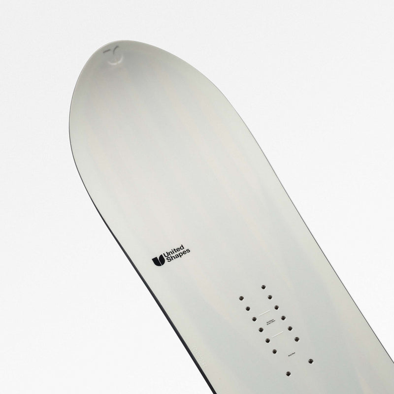 Nose close-up shot of white and blue freeride snowboard Cadet by United Shapes 