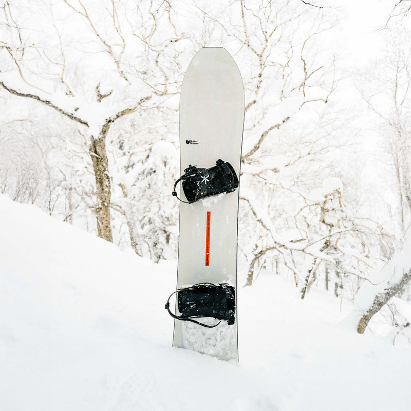 United Shapes Deep Reach snowboard in deep powder