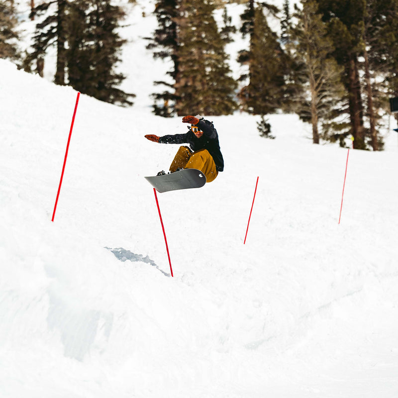 Snowboarding jibbing around mountain with Horizon board by United Shapes