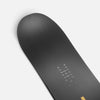 United Shapes black and yellow all-mountain snowboard Horizon nose close-up shot
