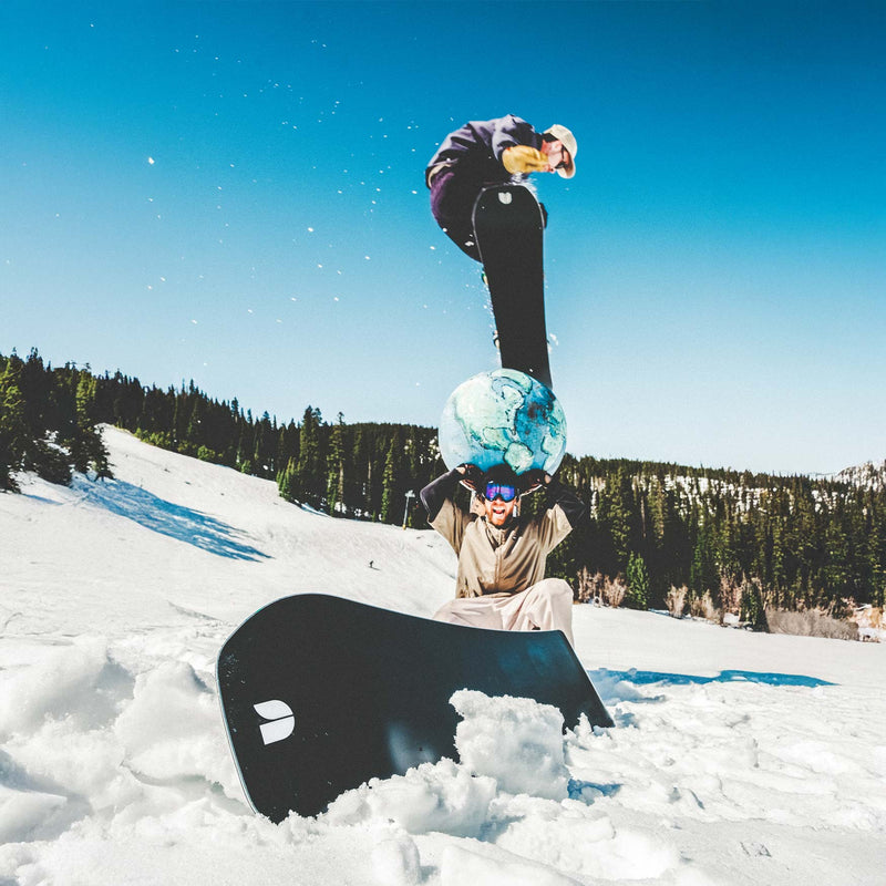 Freestyle snowboarder in half-pipe jumping with Object by United Shapes